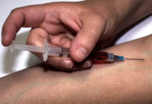 taking an injection